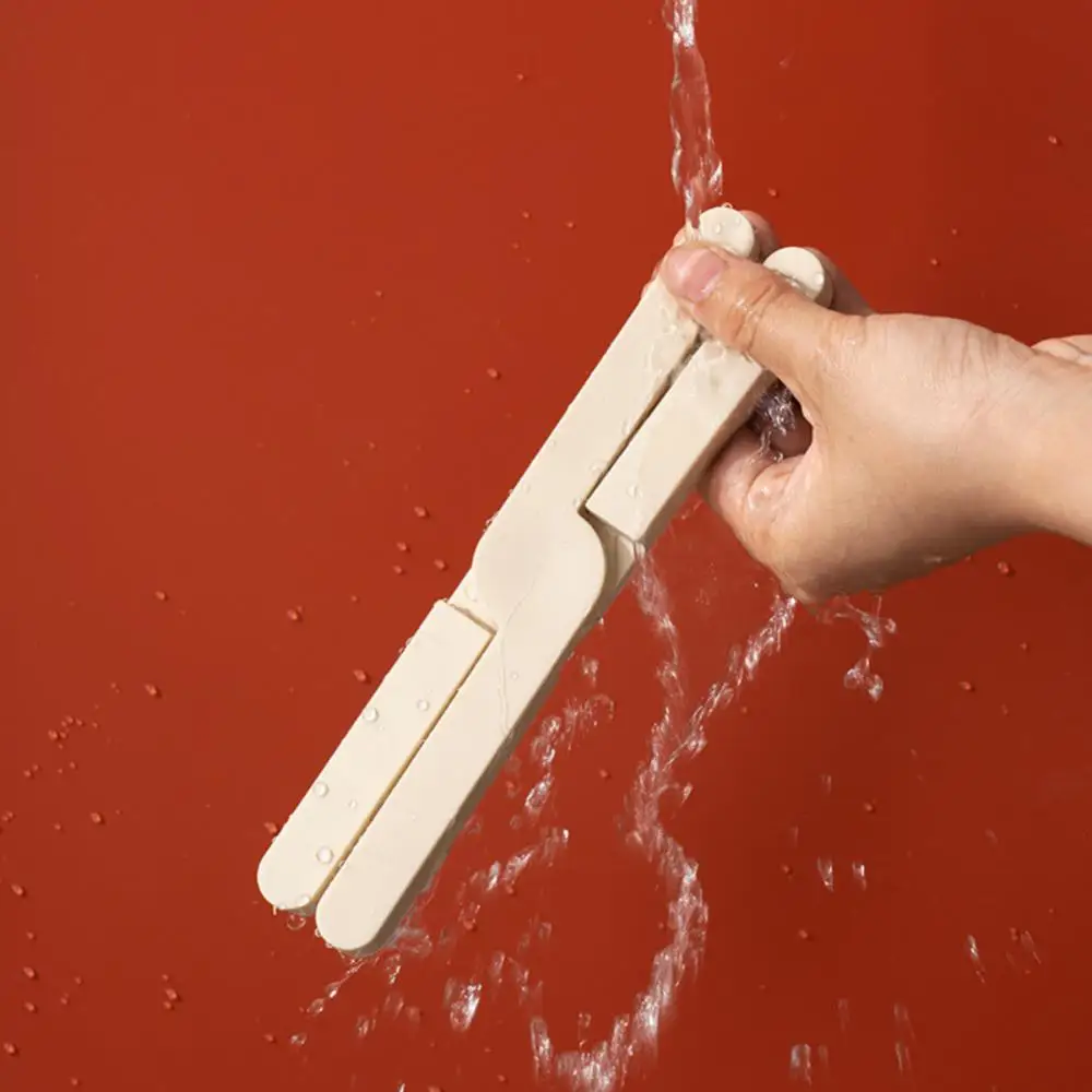 Description Picture 2 of itemSilicone Heat Resistant Pad Foldable Non-Slip Pot Pan Mat Table Placemat Dish Plate Cross Holder Coaster Kitchen Table Trivet