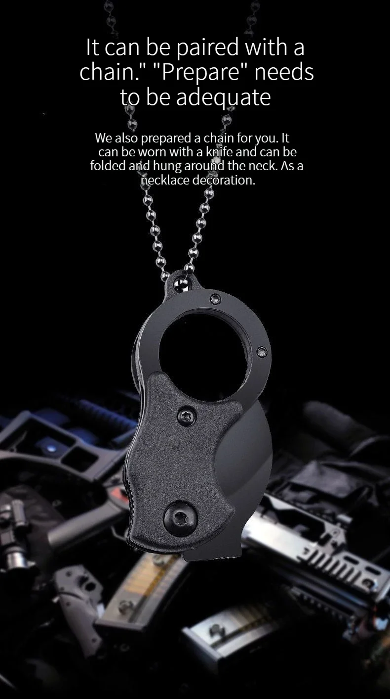 Anahtarlık aksesuarlarıyla birlikte gösterilen mini bıçak