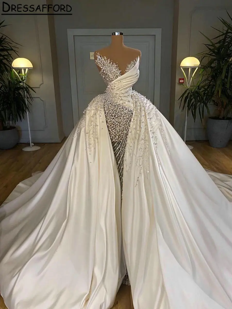 

Real Image V-Neck Illusion Pleat Dubai Wedding Dresses Mermaid Sleeveless Beading Crystal Pearls Saudi Arabic Bridal Gown