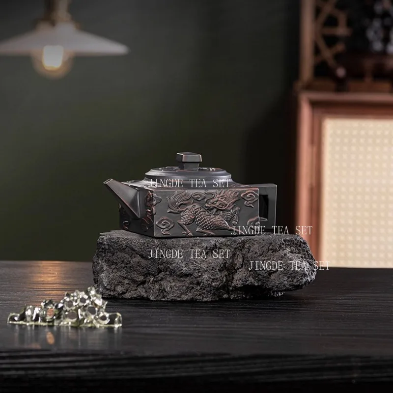 200ml Yunnan Purple Pottery Teapot Home Handmade Carving Qilin Four Sided Rotating Phoenix Singing Pot Large Capacity Teapot
