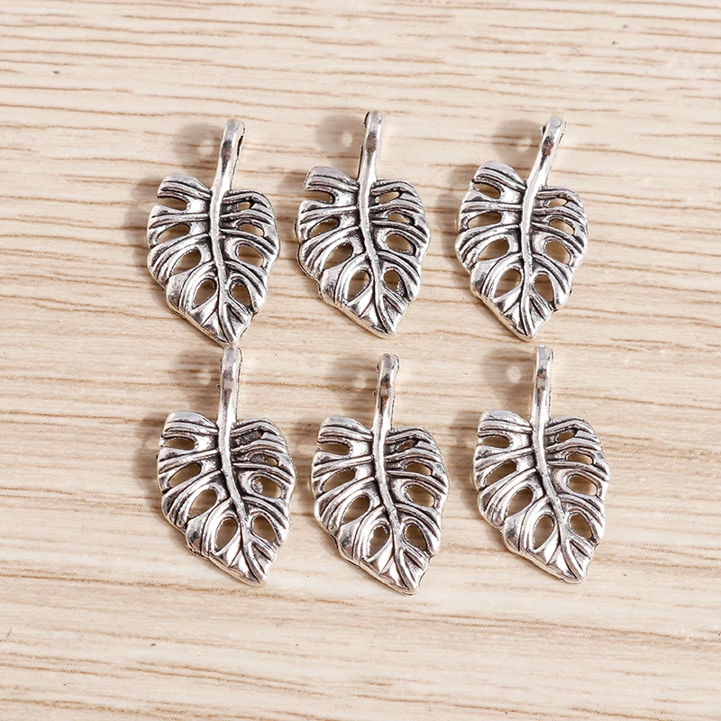 50 stücke 18x10mm niedliche Legierung hohlen Baum Blatt Charms Anhänger für die Herstellung von Ohrringen Halsketten Armbänder DIY Handwerk Schmuck Ergebnisse