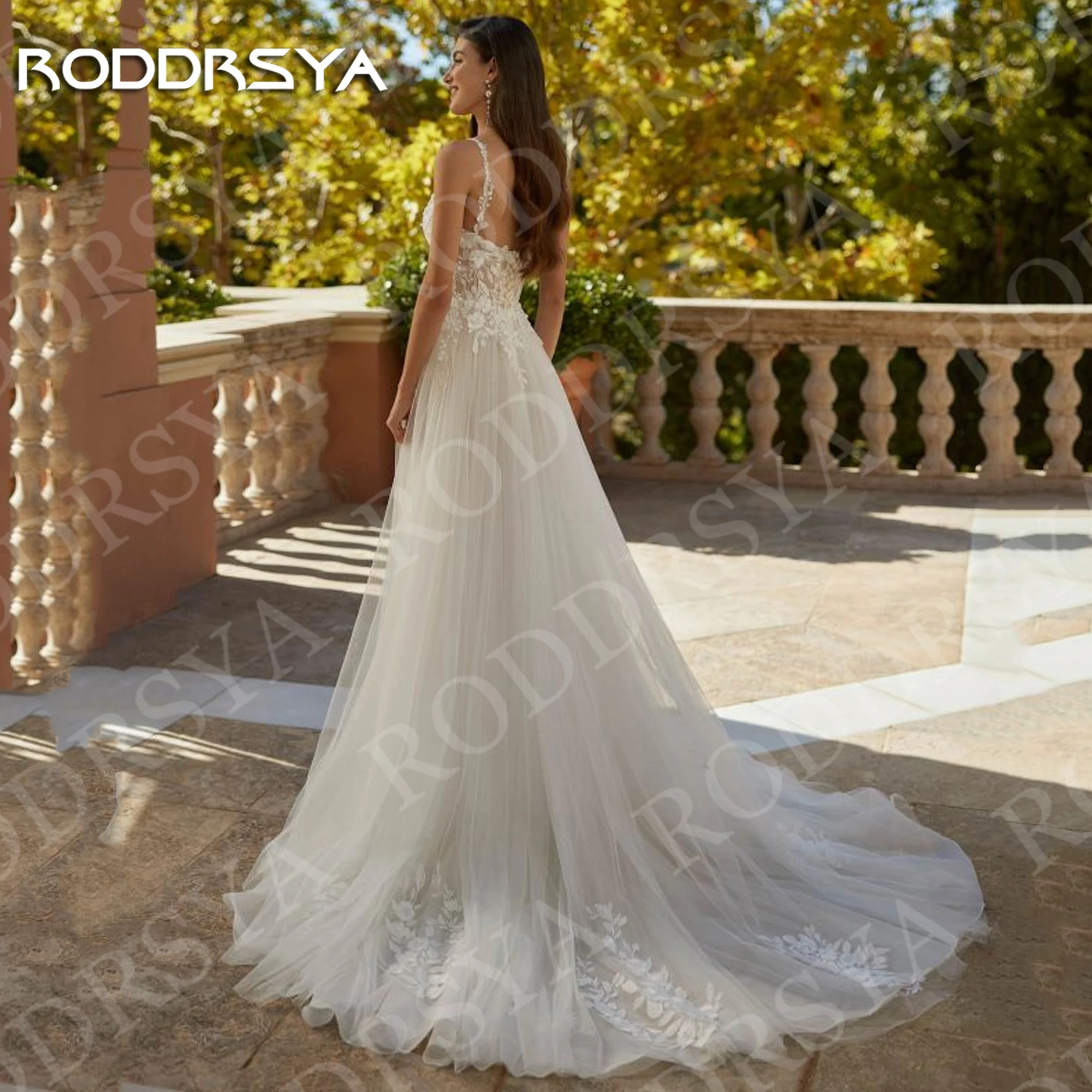 RODDRSYA Spaghetti Strap Wedding Dress A Line Sleeveless Side Slit Floral Lace Applique Tulle Beach Bridal Gown Woman