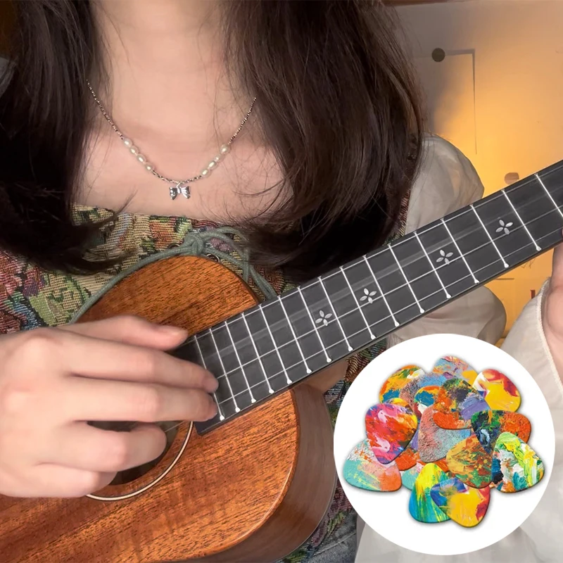 Juego De 10 Púas De Guitarra ABS 0.46 Mm + Soporte Adhesivo – Colores Aleatorios – Para Guitarra Acústica, Ukelele Y Bajo – Accesorios Versátiles