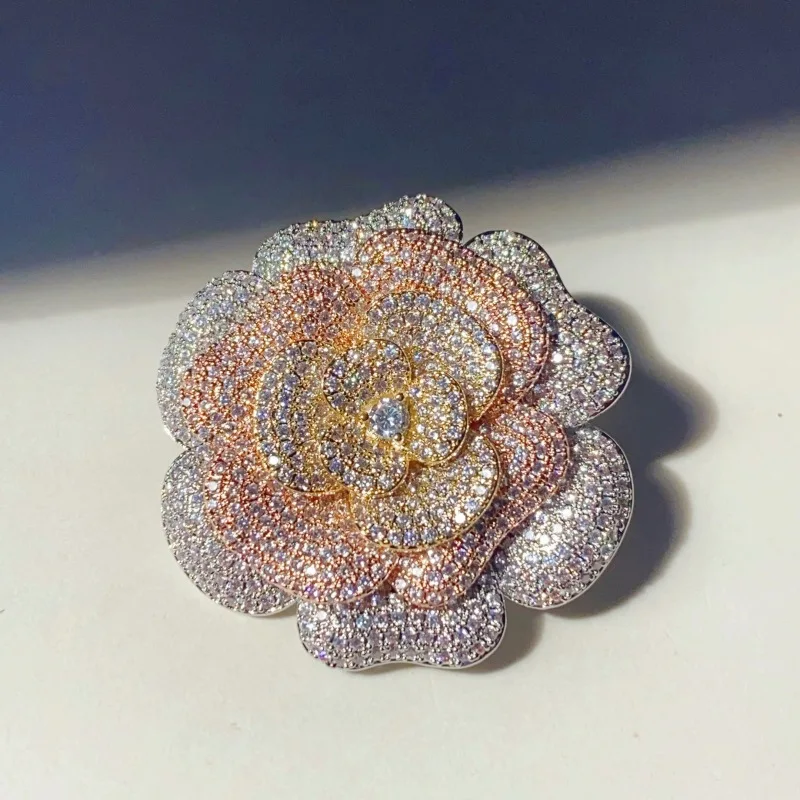 

Women Tricolor gold full of zirconia rose brooch