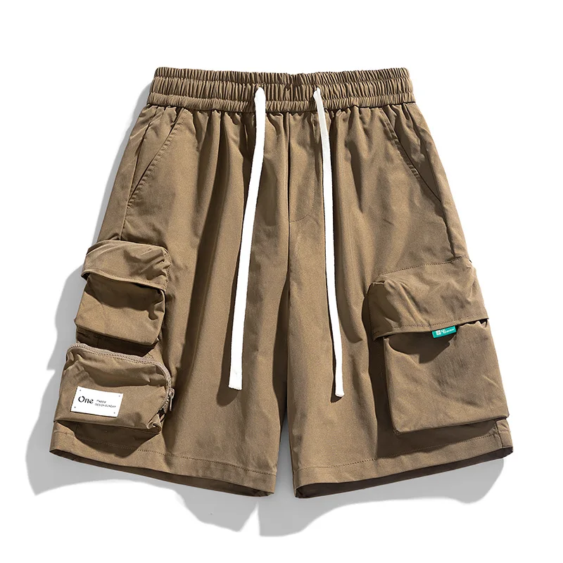 Fashion Spliced Pockets Solid Color Cargo Shorts Men's Clothing 2024 Summer New Loose Elastic Lace Up Solid Color Casual Shorts