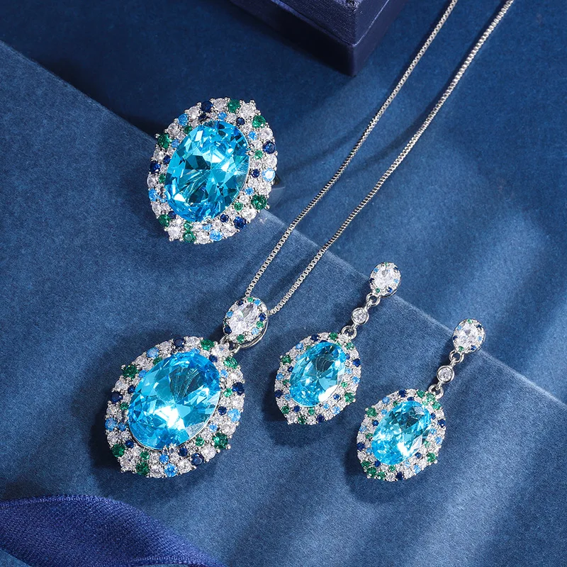 

Роскошное овальное синее аквамариновое циркониевое ожерелье с кулоном и серьги-гвоздики регулируемое кольцо женский Банкетный Свадебный комплект ювелирных изделий