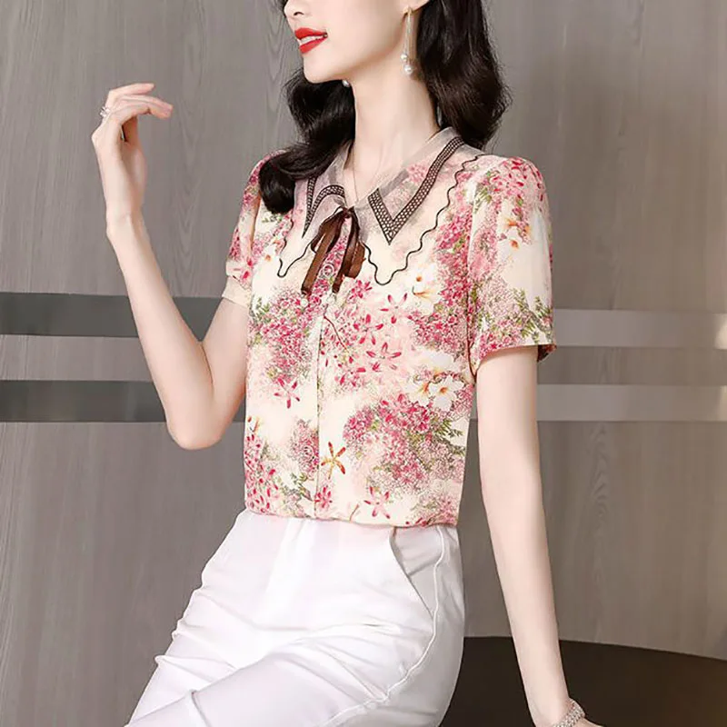 Vintage Printed Spliced Lace Up Bow Floral Blouse Women Clothing 2023 Summer New Oversized Casual Pullovers Loose Commute Shirt