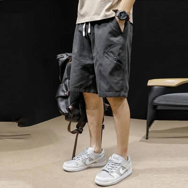 Summer New Solid Color Fashion Elastic Waist Knee Length Pants Man High Street Cotton Pocket Patchwork Button Straight Pants