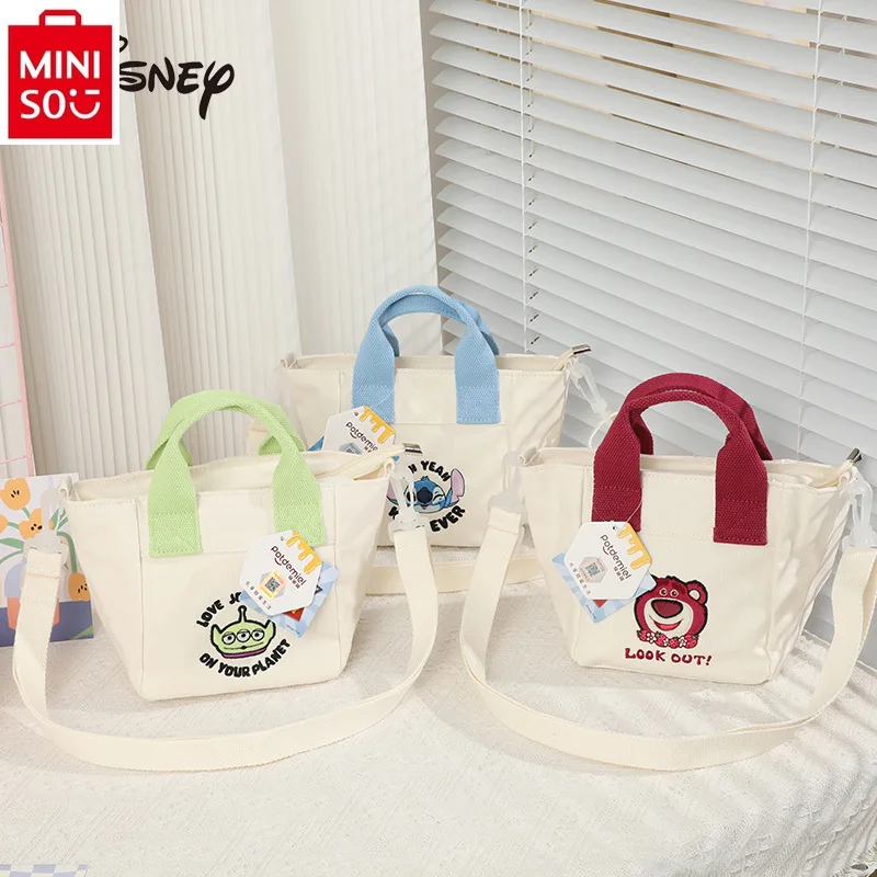 

MINISO Disney Cartoon Strawberry Bear Three Eyes Stitch Canvas Handheld Small Square Bag Student Fashion Versatile Crossbody Bag