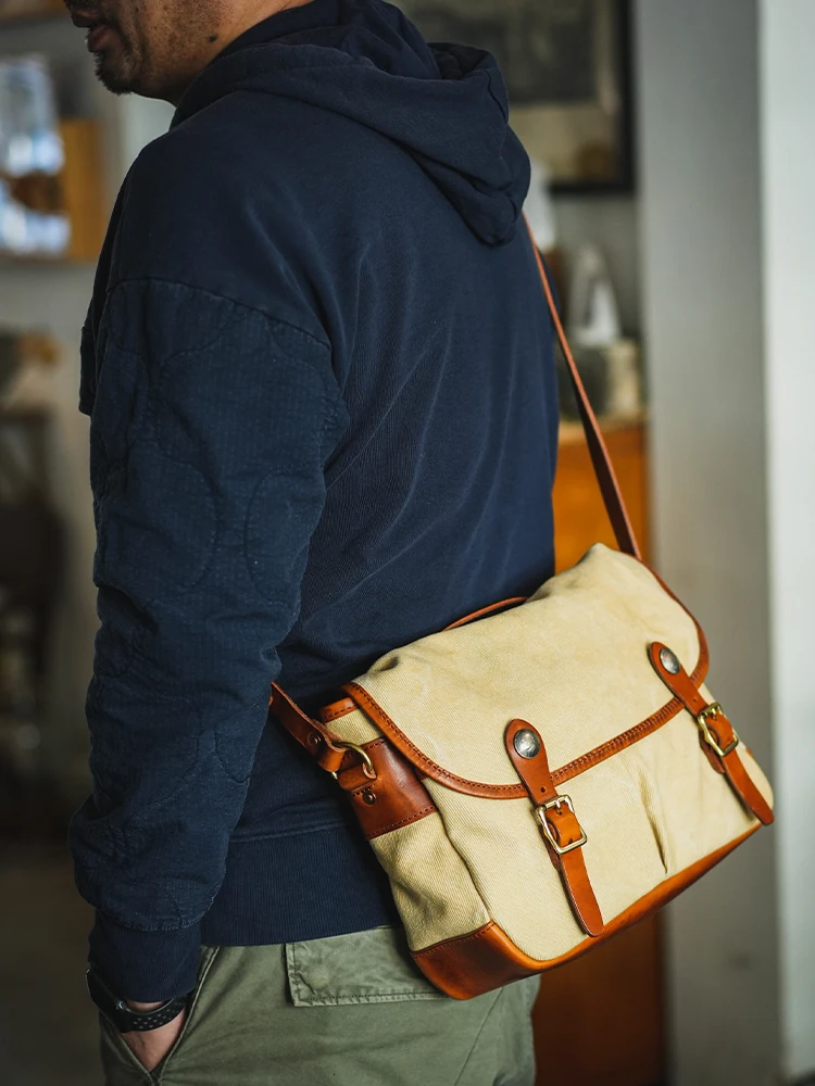 Fashion vintage casual luxury canvas first layer leather men's messenger bag business outdoor travel designer shoulder bag