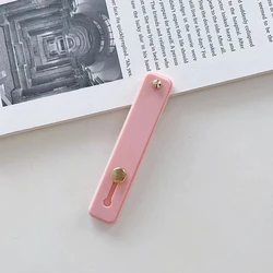 Universal Plain Color Phone Socket Holder with Finger Grip and Stand Functionality (Pink)