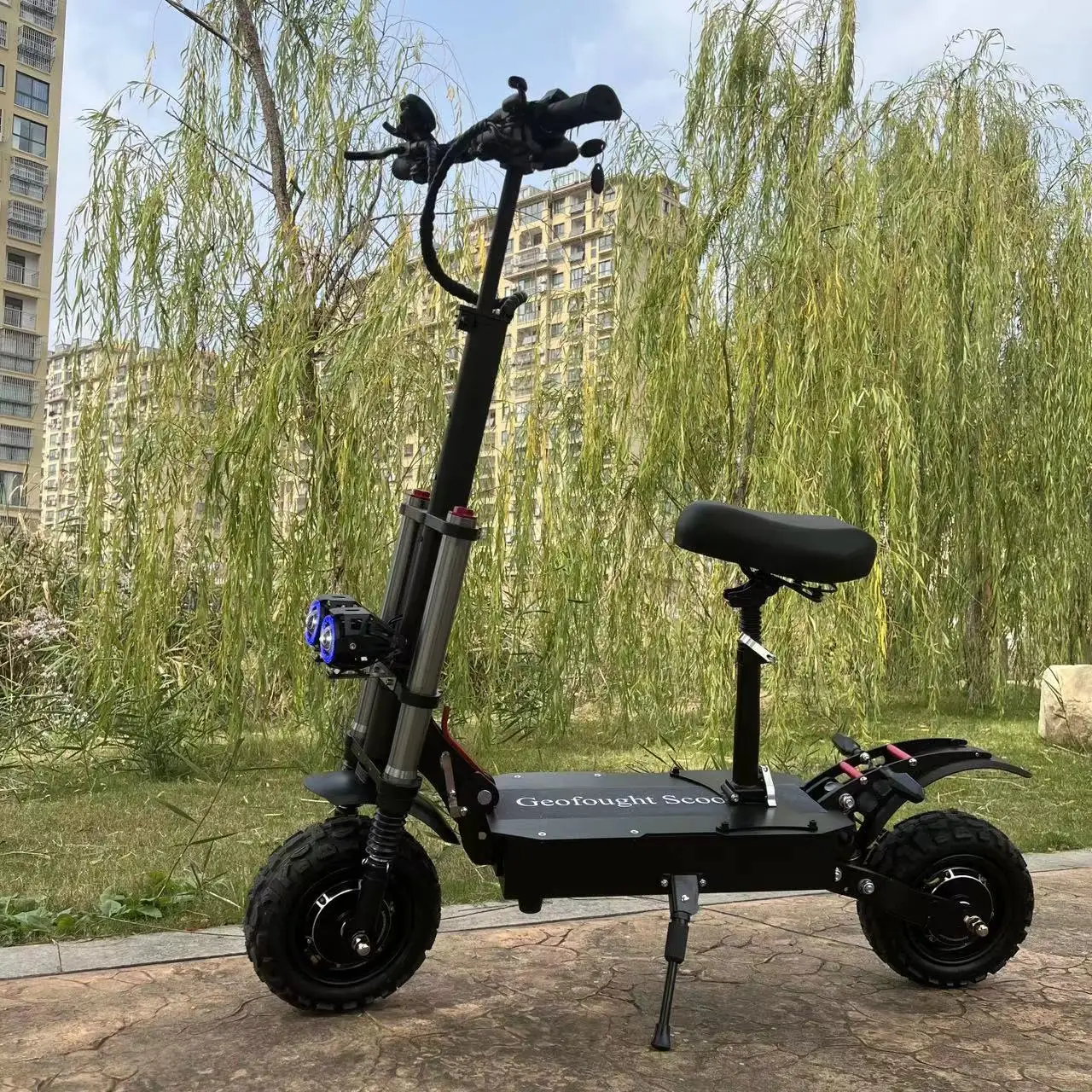 Hot selling long range 60v 25-40Ah lithium battery 6000w dual motor 11inch off road tires Electric Scooter with Seat For Adult