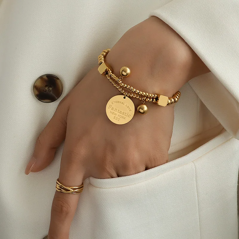 Gold Tone Copper Alloy Twisted Charm Bracelet With Pom Poms For Women Everyday Accessory main image 0