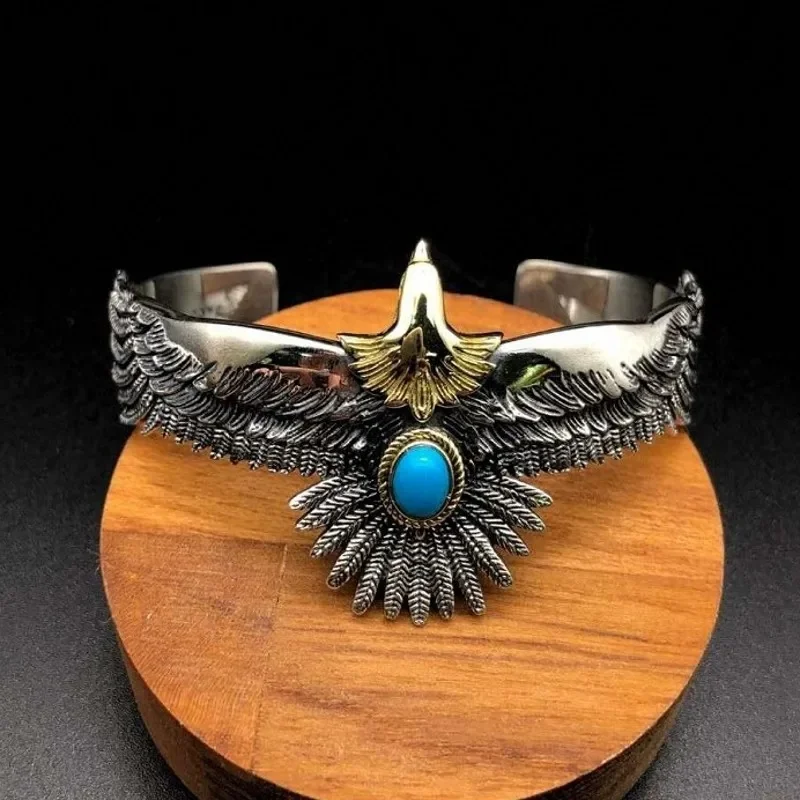 

Браслет мужской из серебра пробы с перьями и синим камнем