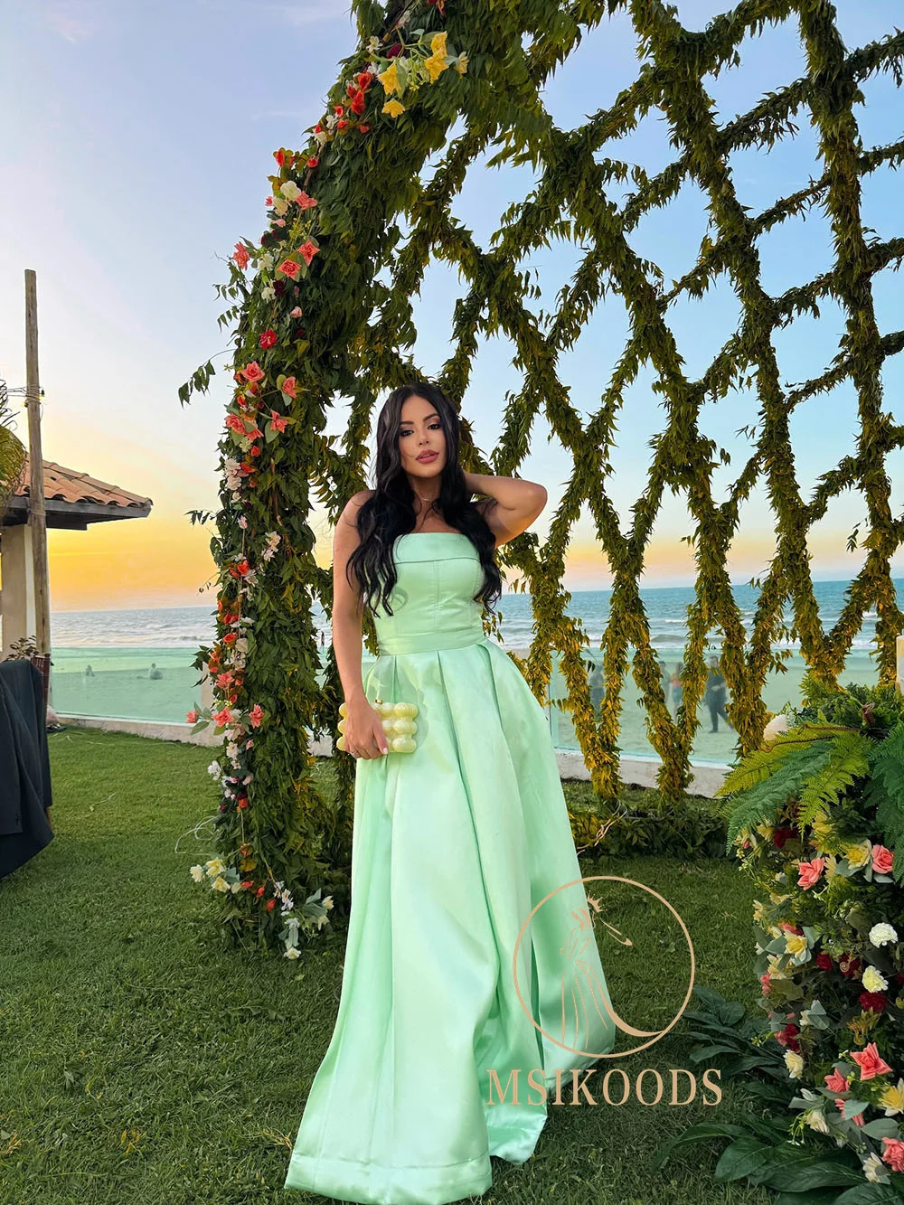 فستان سهرة ستان اخضر 2025