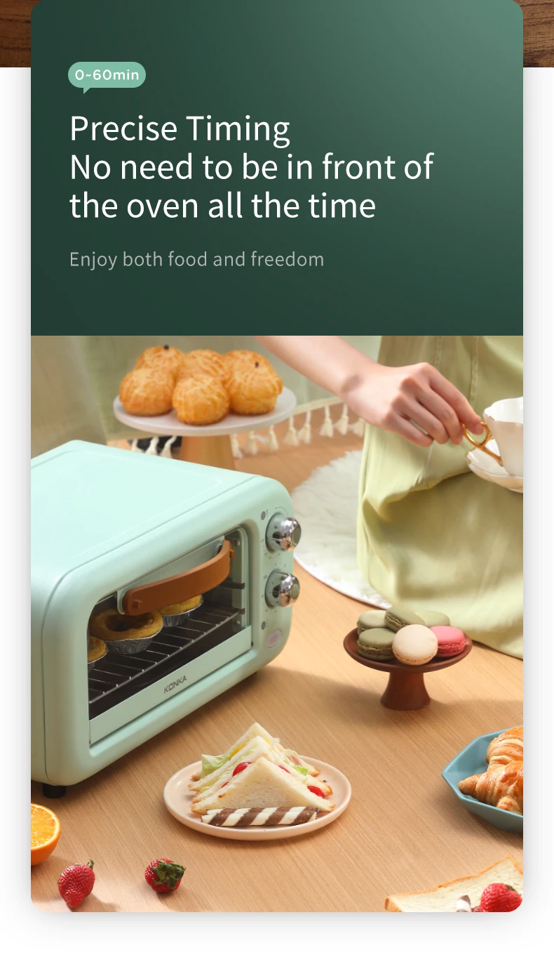 A woman is holding a 12L capacity toaster in front of a table with food on it.