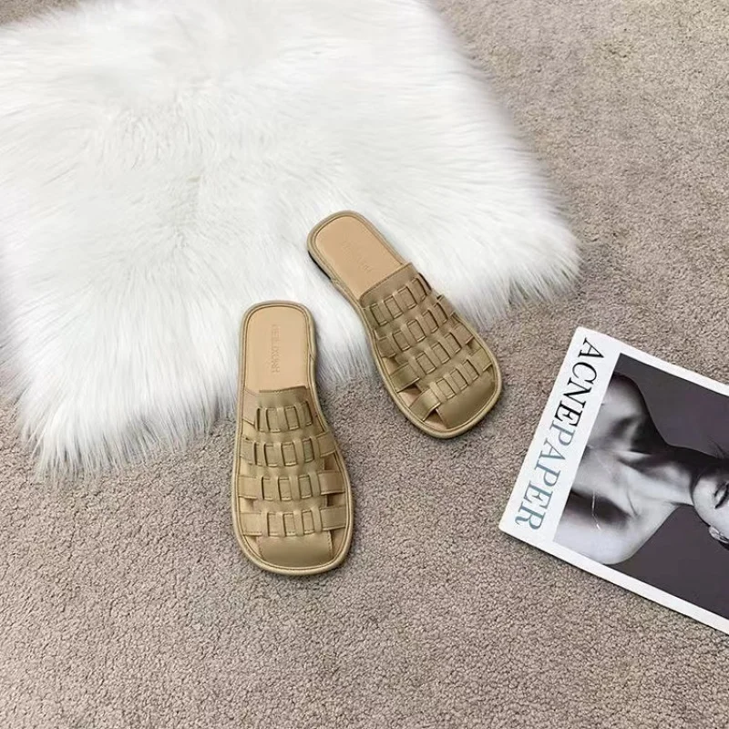 

Flat bottom slippers women's summer fashion outer wear hollow woven Baotou half slippers 2022 new net red sandals