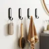 TAILI Hanging Wall Hooks with Adhesive Strips Utility Hooks for Home Storage 4 Hooks and 6 Strips Included, Damage Free for Wall 1