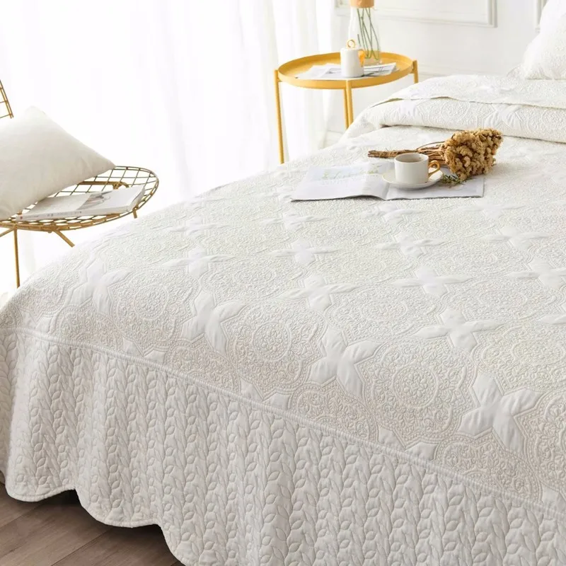 Double sided Embroidered Cotton Quilted Bedspread on the Bed Padded