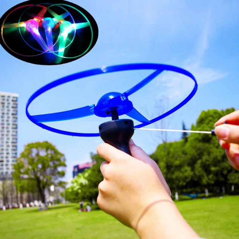 Kid Sports Pull Line Saucer Toys Children Outdoor Fun Rotating Flying Toy LED Light Parks Beach