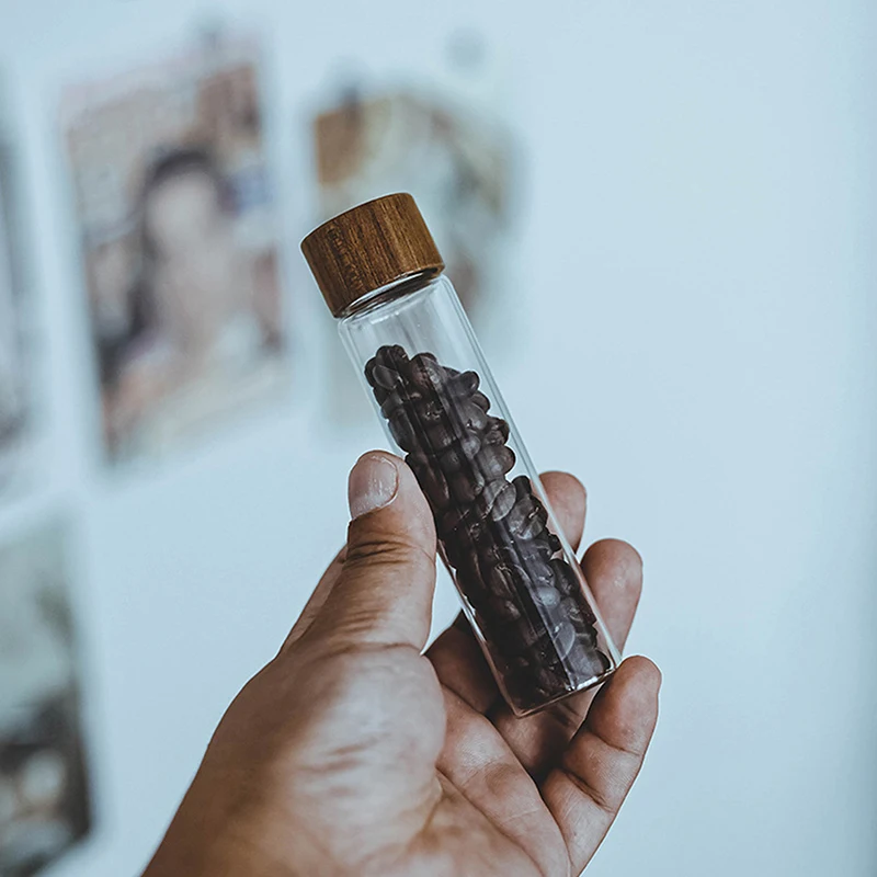 حاوية قهوة زجاجية بغطاء خشبي