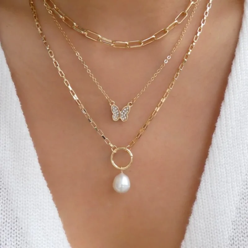 

Europe and America 2023 Fashion and Fashion New Pearl Chain Butterfly Necklace 3 Piece Set Wholesale Women and Jewelry Gifts