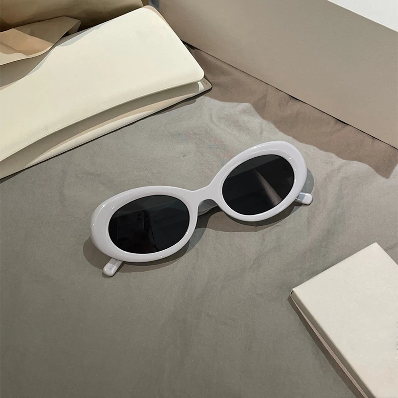 

2023 top quality Gray plate sun glasses UV protection holiday travel ladies fashion glasses