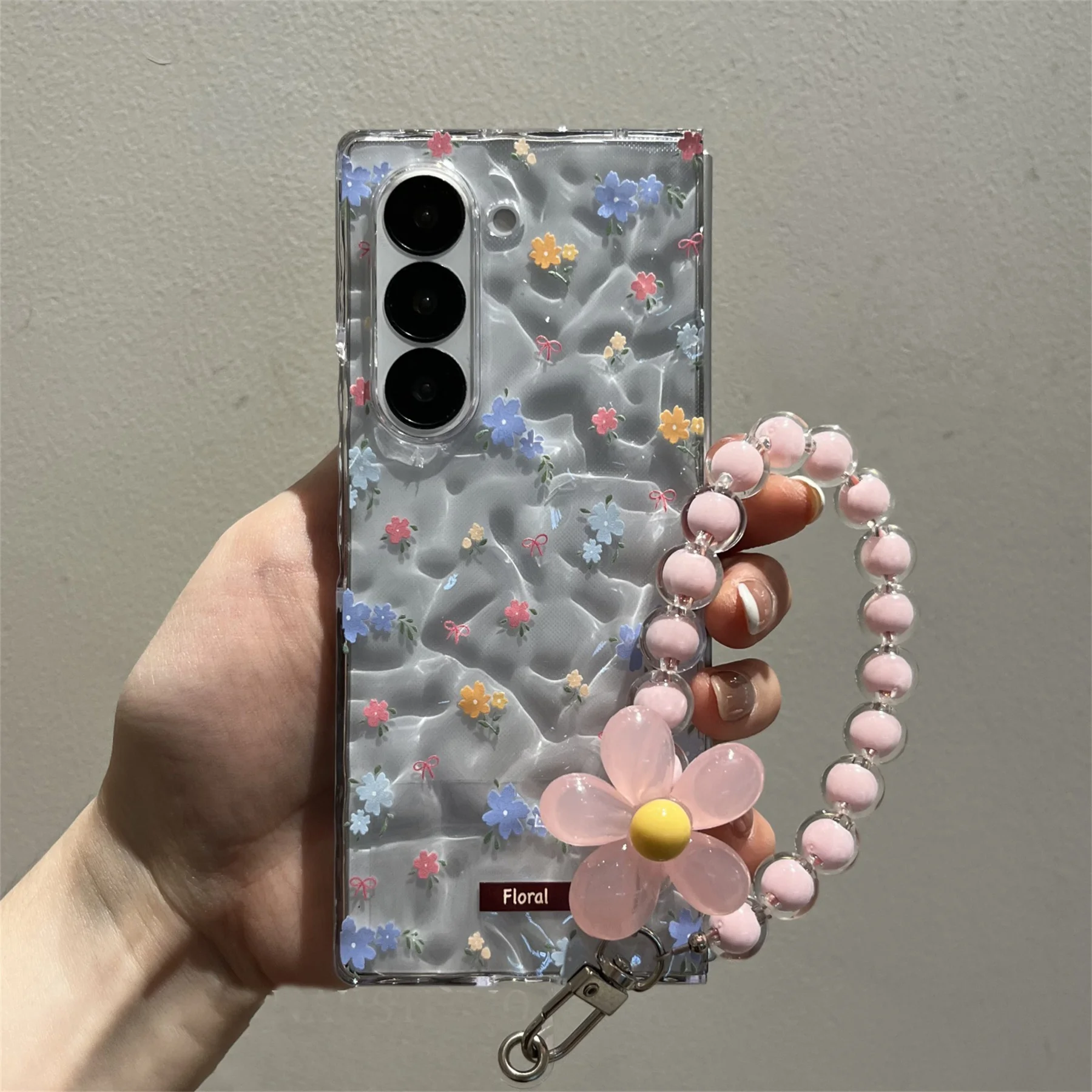 Cute Blue Floral Transparent Phone Case with Flower Chain Accents