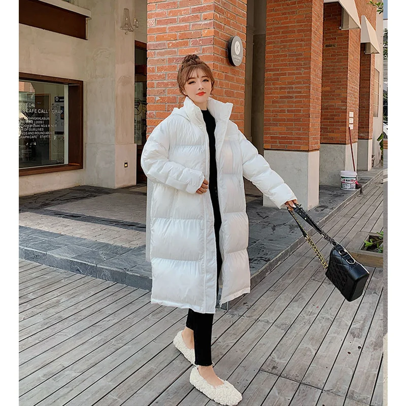 Рисунок 3 - Женский длинный пуховик с капюшоном