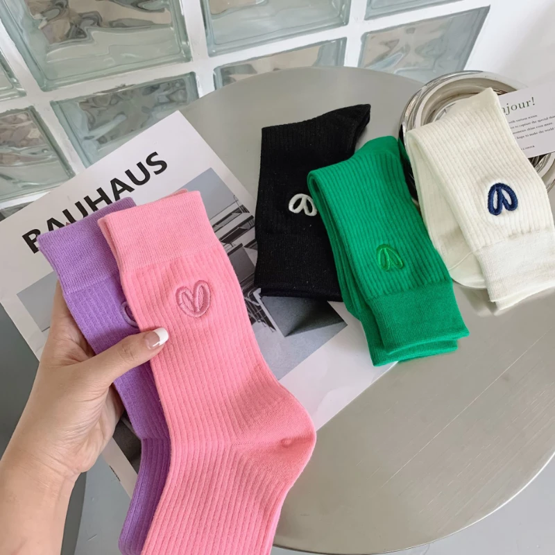 

Socks stockings Women's spring and autumn solid color cotton love embroidered pile pile socks mid-tube sports socks