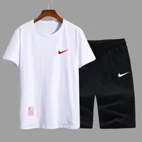 Nike Sports Suit Men and  Women  Embroidered  Couple  Cotton  Athletic  Short  Sleeved  Shorts  Set  White and Black 1