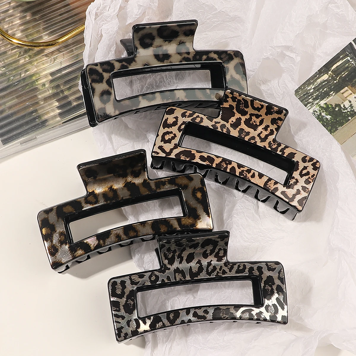 4 pieces of tortoiseshell hair claw clips, stylish leopard print hair accessories for women, strong hair clips for thick fine hair.