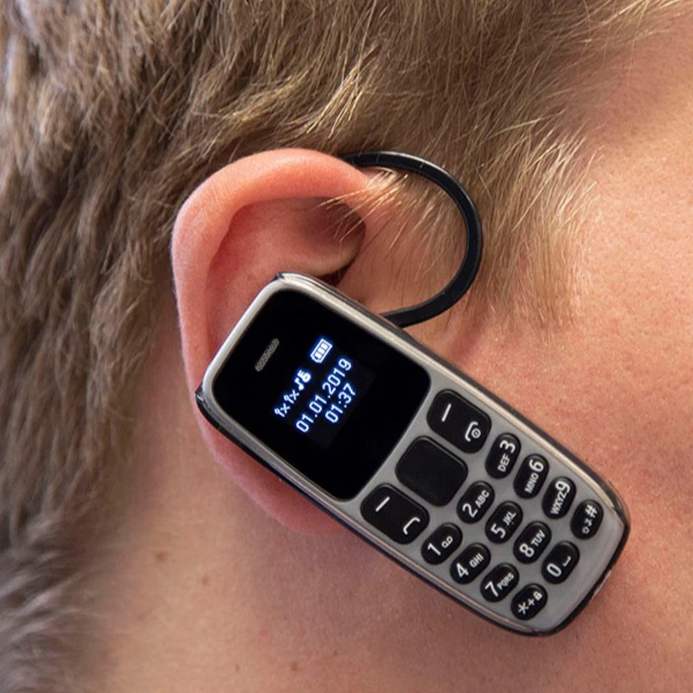 

Wireless BT2.0 Headphone Dialer Earphones Mini Phone BM10 Remote Control Camera Earpieces Magic Voice Call Handfree Pocket Pho