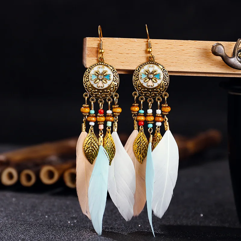 Boucles d'oreilles bohémiennes vintage pour femmes, bijoux longs en plumes sculptées, 2024