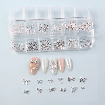 TSZS 12 Griglie 3D Fiocco d'argento Gioielli Nail Art Charms Mix Forma Bowknot Charms per unghie Nastro Decorazione per manicure per unghie 1