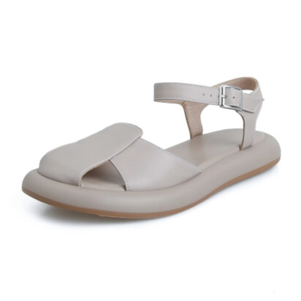 

Leather hollowed out sandals women 2023 outside wear super soft sponge cake thick soled everything casual beach shoes