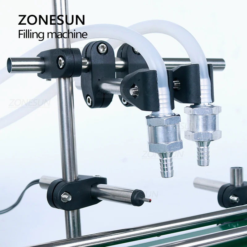 ZONESUN Automatic Double Nozzles High Temperature Heat Resistance Perfume Water Bottle Filling machine With Conveyor ZS-DPYT200L