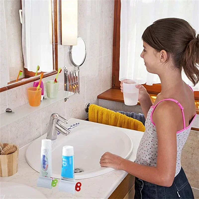 5-50pcs Rolling Tube Toothpaste Squeezer Toothpaste Seat Holder Stand Rotate Toothpaste Dispenser for Bathroom Accessories 2