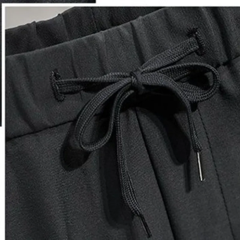 Summer 2024 Men's New Business Casual Patchwork Pocket Drawstring Fashion Solid Color Slim Minimalist All-match Harlan Pants