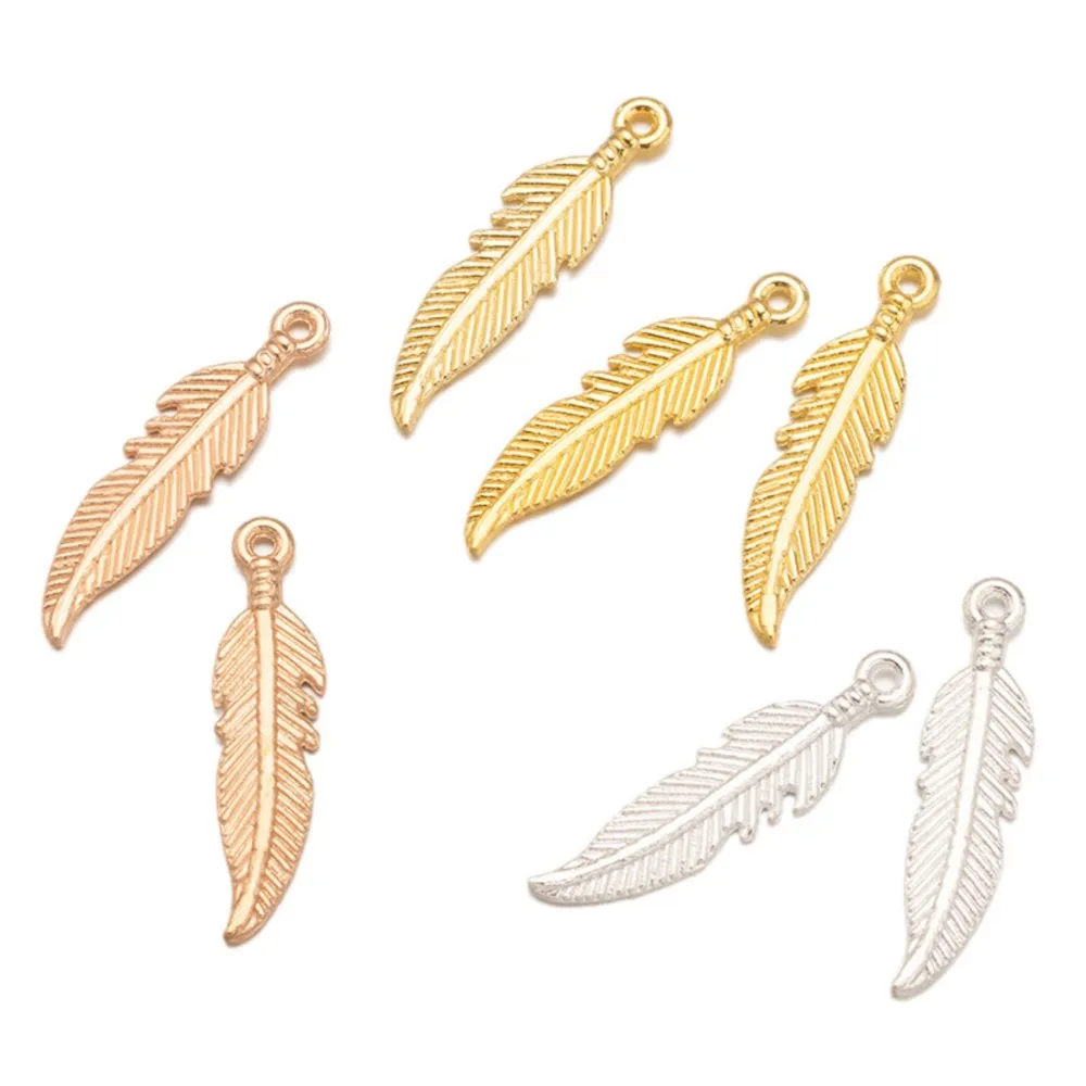 50 Stück 7 x 26 mm goldene Metall-Zink-Legierung Federn Charms Anhänger für DIY handgemachte Handwerk Ohrringe Halskette Schlüsselanhänger Schmuckherstellung