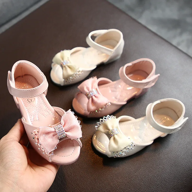 Zapatos de princesa con lazo para niñas, sandalias Peep Top de moda para fiesta, boda, zapatos de cuero para niños con diamantes de imitación de colores