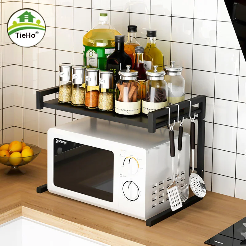 https://ae01.alicdn.com/kf/Sbef0b4dd9f304a13abc22681b67ff2bfk/Expandable-Height-Adjustable-2-Tier-Microwave-Oven-Rack-Toaster-Countertop-Stand-for-Hanging-Kitchen-Utensils-Tableware.jpg