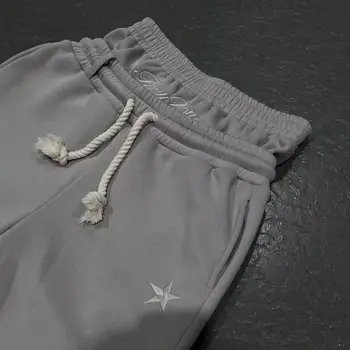 2025 Pantaloni sportivi vintage a doppio strato Pantaloni lunghi con coulisse in vita elastica con tasche Pantaloni casual con stampa di stelle in due pezzi finti 1