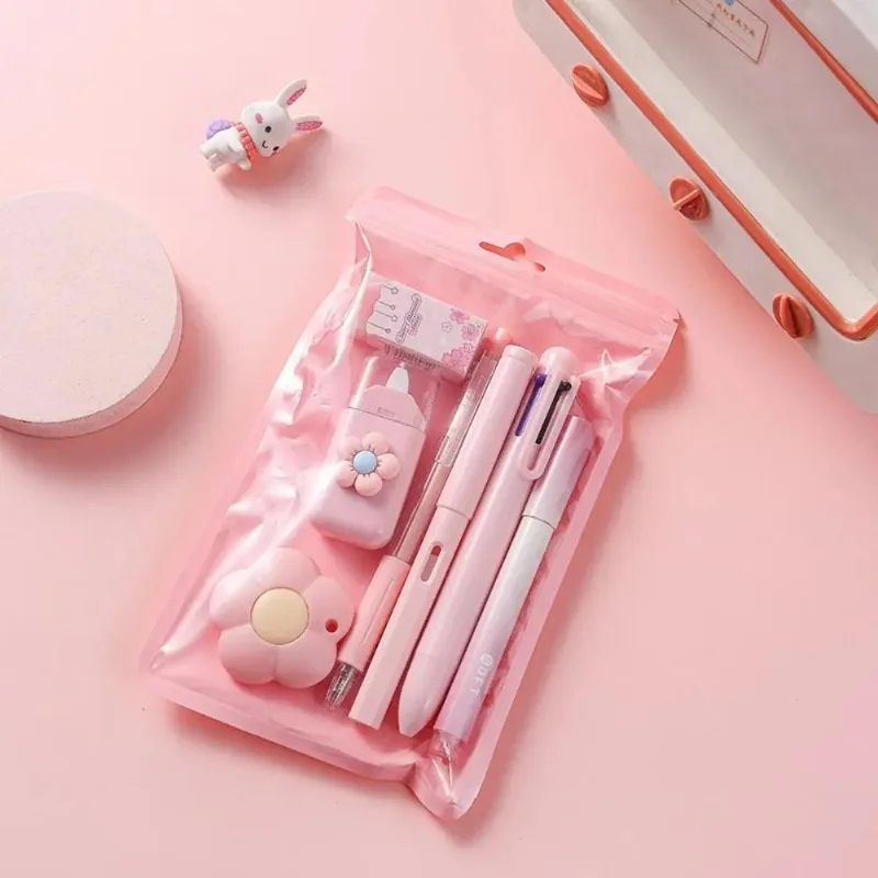 Kit di cancelleria rosa da 7 pezzi con penne, temperamatite e strumenti