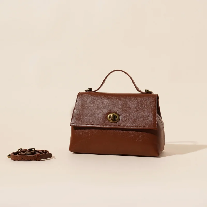Retro top cowhide single shoulder small square bag, new flip cover crossbody bag, unique women's office crossbody bag