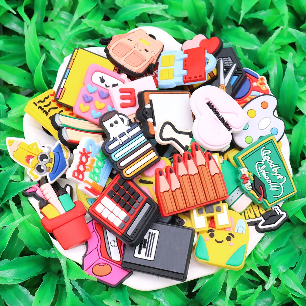 

50PCS PVC Cartoon Croc Jibz Charms Book Calculator Laptop Pen Sharpener Pencil Schoolbag Garden Shoes Clog Decorations Kids Gift