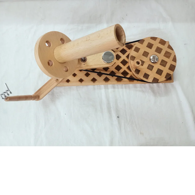 

wooden ball yarn winders with a checkered laser engraved pattern suitable for yarn and fiber art stores for resale
