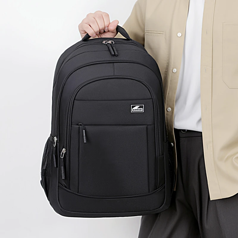 Adjustable padded shoulder straps, practical pockets, minimalist black casual work travel backpack suitable for commuting, schoo