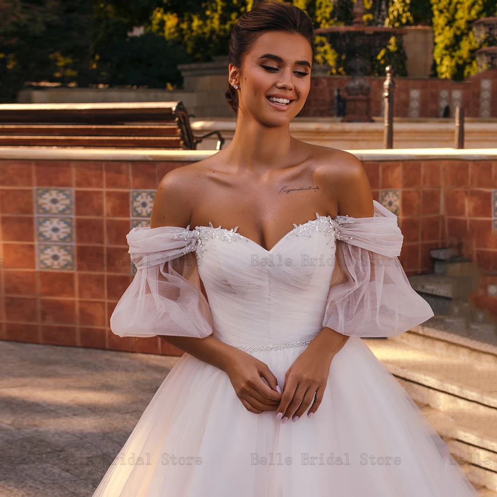 Elegant A-Line Wedding Dresses 2023 Off Shoulder Detachable Sleeves African Bridal Gowns Beaded Sweep Train Tulle Custom Made