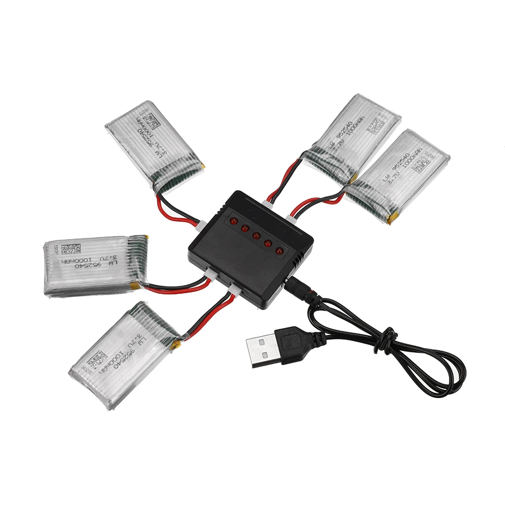 Batteries drone et chargeur dans un emballage compact, accessoires essentiels pour pilotes.